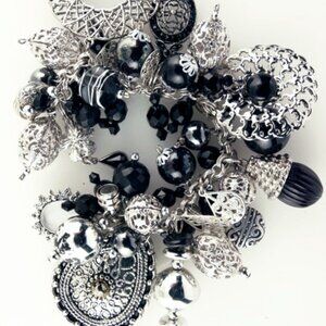 Moroccan - inspired black and silver charm bracelet